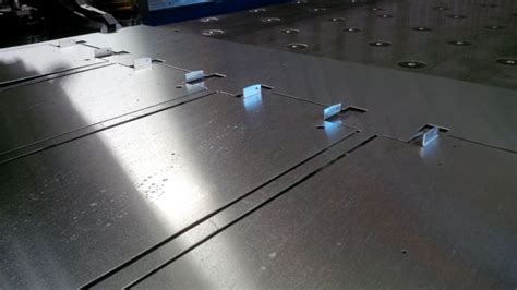 break off tabs sheet metal|punching sheet metal tabs.